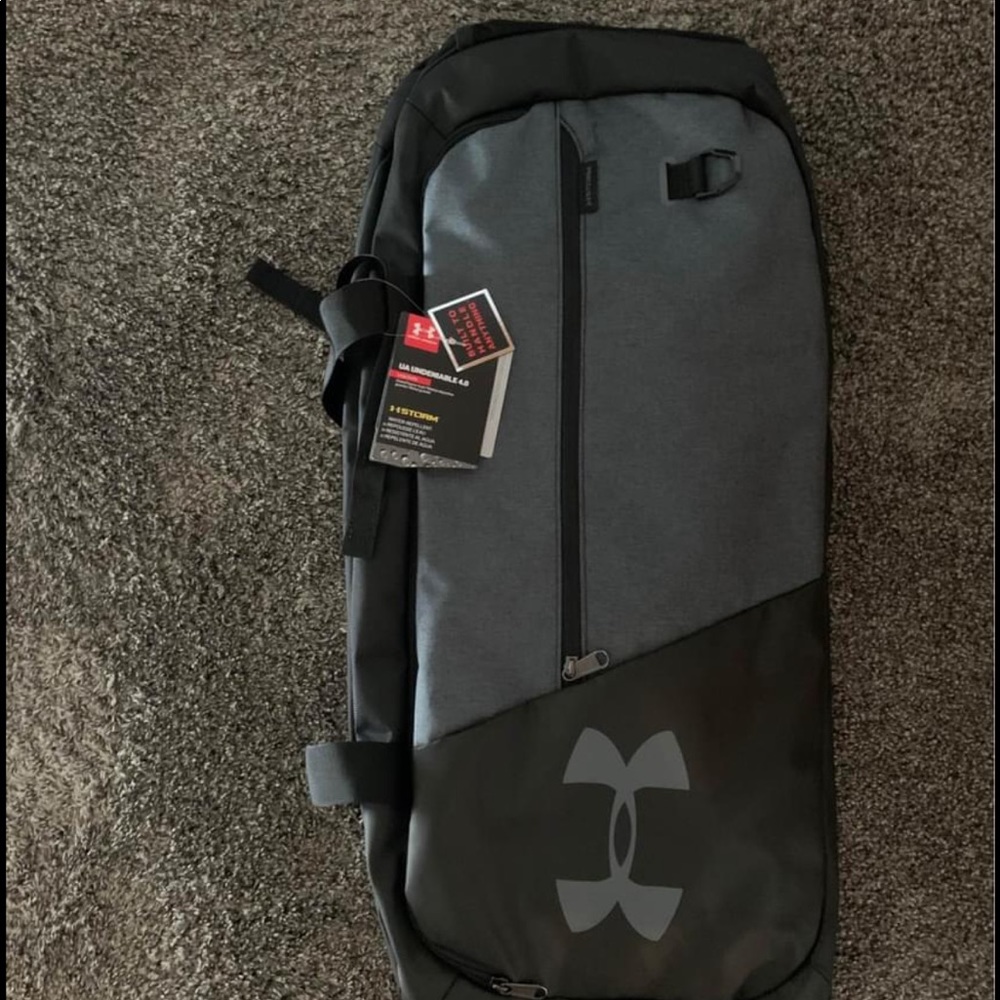 Brand new large grey under armour duffle bag.
